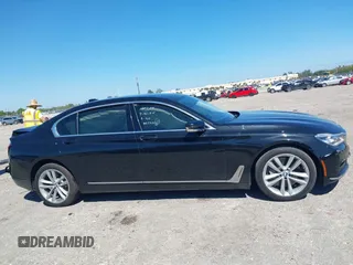 2018 BMW 7 Series 750i with VIN WBA7F0C54JGM22900, listed as a IAAI auction lot 41673673 with 66,264 mi miles. Bid and sale history available at carsss.com. Image 12.