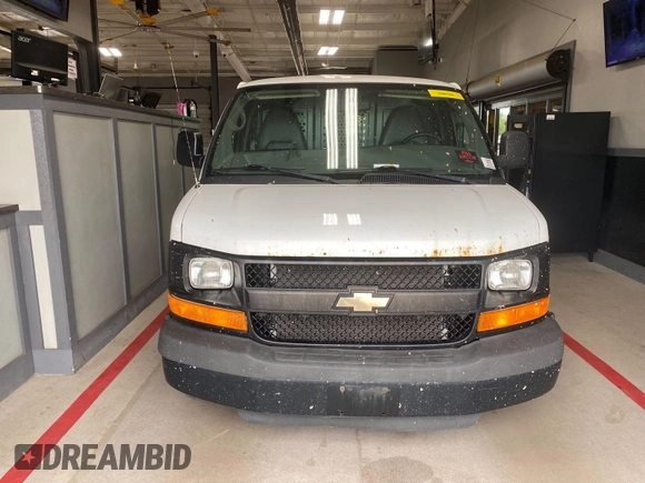 2014 Chevrolet Express Cargo z VIN 1GCSGAFX7E1163258, wystawiony jako IAAI lot #42501106 z przebiegiem 214 104 mil mil oraz . Historia ofert i sprzedaży dostępna na DreamBid. Obrazek 34.