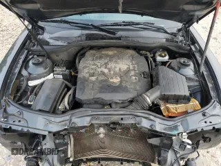 2013 Chevrolet Camaro LS z VIN 2G1FA1E3XD9187283, wystawiony jako Copart lot #53967945 z przebiegiem 146 681 mil mil oraz Czysty tytuł • Clean title. Historia ofert i sprzedaży dostępna na DreamBid. Obrazek 11.