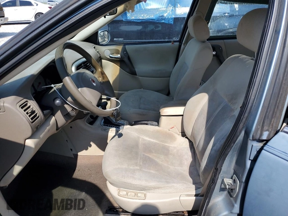 2003 Saturn LS z VIN 1G8JU54F43Y501252, wystawiony jako Copart lot #76197934 z przebiegiem 52 856 mil mil oraz Szkoda całkowita • Salvage title. Historia ofert i sprzedaży dostępna na DreamBid. Obrazek 7.