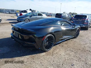 2020 McLaren GT with VIN SBM22GCA1LW000498, listed as a IAAI auction lot 41265247 with 18,465 mi miles. Bid and sale history available at carsss.com. Image 4.