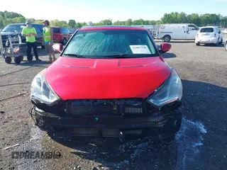 2013 Hyundai Veloster Turbo z VIN KMHTC6AE3DU169229, wystawiony jako IAAI lot #42087798 z przebiegiem 120 741 mil mil oraz . Historia ofert i sprzedaży dostępna na DreamBid. Obrazek 12.