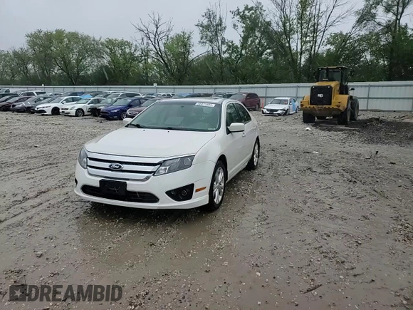 2012 Ford Fusion SE z VIN 3FAHP0HA4CR185059, wystawiony jako Copart lot #56875985 z przebiegiem 173 644 mil mil oraz Nie do naprawy. Historia ofert i sprzedaży dostępna na DreamBid. Obrazek 13.