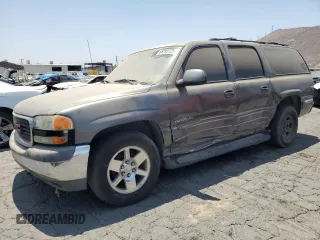 2002 GMC Yukon XL SLT with VIN 3GKEC16T82G204908, listed as a Copart auction lot 65743725 with 257,613 mi miles and Salvage title. Bid and sale history available at DreamBid. Image 1.
