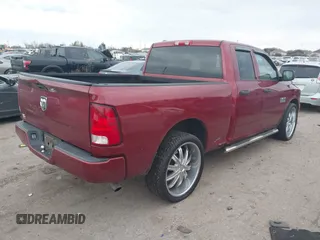 2014 Ram 1500 Tradesman with VIN 1C6RR6FG4ES454808, listed as a IAAI auction lot 41368359 with 233,684 mi miles and . Bid and sale history available at DreamBid. Image 4.