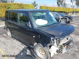 2004 Scion xB with VIN JTLKT324840149980, listed as a IAAI auction lot 41670229 with 193,674 mi miles. Bid and sale history available at carsss.com. Image 1.