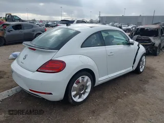 2019 Volkswagen Beetle S with VIN 3VWFD7AT2KM701622, listed as a IAAI auction lot 41520300 with 1 mi miles. Bid and sale history available at carsss.com. Image 4.