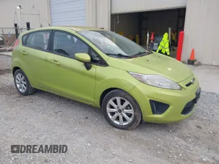 2011 Ford Fiesta SE with VIN 3FADP4EJXBM164397, listed as a IAAI auction lot 42046591 with 118,953 mi miles. Bid and sale history available at carsss.com. Image 1.