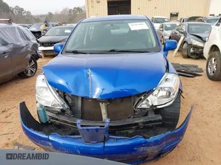 2012 Nissan Versa S with VIN 3N1BC1CP0CK239739, listed as a IAAI auction lot 41763481 with 146,605 mi miles. Bid and sale history available at carsss.com. Image 12.