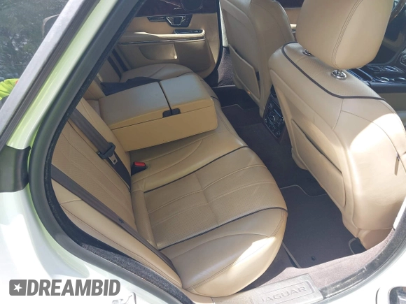 2015 Jaguar XJ with VIN SAJWA1CZ0F8V75119, listed as a IAAI auction lot 42248663 with 94,060 mi miles and . Bid and sale history available at DreamBid. Image 8.