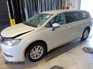 2017 Chrysler Pacifica Touring with VIN 2C4RC1DG5HR764942, listed as a IAAI auction lot 42255421 with 64,381 mi miles and . Bid and sale history available at DreamBid. Image 6.