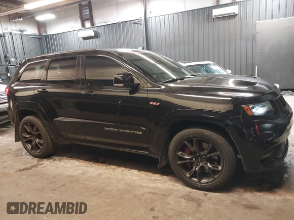2017 Jeep Grand Cherokee SRT with VIN 1C4RJFDJ9HC819478, listed as a IAAI auction lot 41325490 with 63,551 mi miles. Bid and sale history available at carsss.com. Image 13.