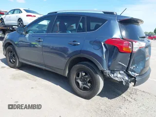 2014 Toyota RAV4 LE with VIN 2T3ZFREV1EW093290, listed as a IAAI auction lot 42343278 with 318,635 mi miles and . Bid and sale history available at DreamBid. Image 3.