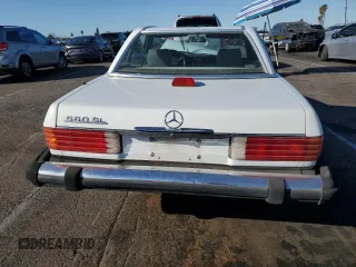 1987 Mercedes-Benz 560 SL with VIN WDBBA48D8HA066224, listed as a Copart auction lot 87976835 with 196,054 mi miles and Salvage Title. Bid and sale history available at DreamBid. Image 6.