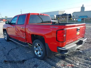 2014 Chevrolet Silverado 1500 LTZ with VIN 3GCUKSEC2EG300040, listed as a IAAI auction lot 42037164 with 64,271 mi miles. Bid and sale history available at carsss.com. Image 3.