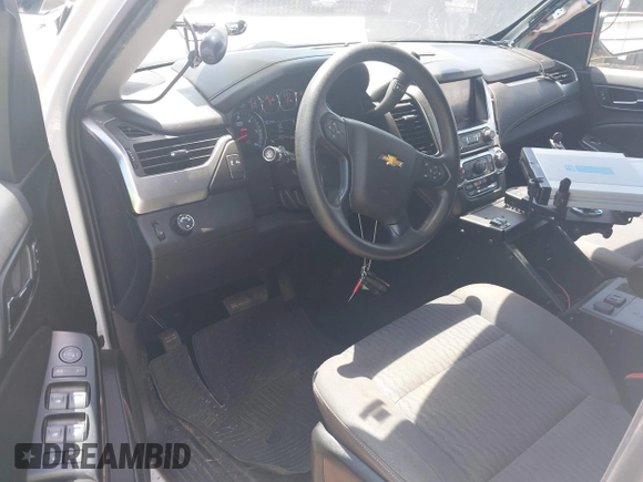 2020 Chevrolet Tahoe Commercial with VIN 1GNLCDECXLR154849, listed as a IAAI auction lot 42050778 with 124,771 mi miles and . Bid and sale history available at DreamBid. Image 18.