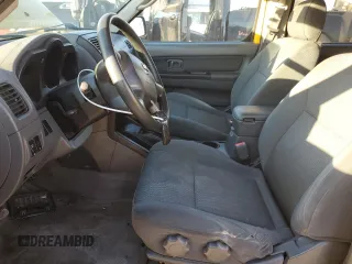 2004 Nissan Frontier XE z VIN 1N6ED27T34C449972, wystawiony jako Copart lot #87205714 z przebiegiem 254 636 mil mil oraz Szkoda całkowita • Salvage title. Historia ofert i sprzedaży dostępna na DreamBid. Obrazek 7.