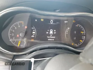 2021 Jeep Grand Cherokee 80th Anniversary with VIN 1C4RJFBG3MC631086, listed as a Copart auction lot 57304375 with 57,872 mi miles and Salvage title. Bid and sale history available at DreamBid. Image 9.