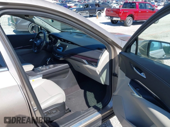 2023 Cadillac XT4 FWD Luxury with VIN 1GYAZAR42PF109650, listed as a IAAI auction lot 41921489 with 23,530 mi miles and . Bid and sale history available at DreamBid. Image 5.