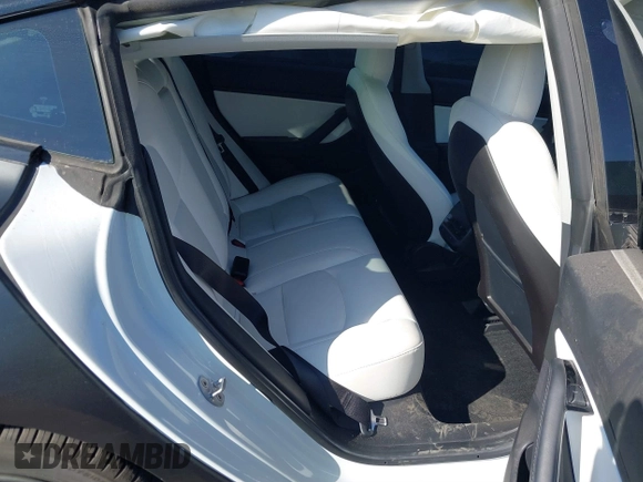 2019 Tesla Model 3 Mid Range with VIN 5YJ3E1EA0KF509547, listed as a IAAI auction lot 40720566 with 41,655 mi miles and . Bid and sale history available at DreamBid. Image 7.
