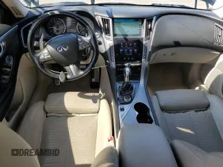 2014 Infiniti Q50 Premium with VIN JN1BV7ARXEM687605, listed as a Copart auction lot 61275535 with 104,337 mi miles and Salvage title. Bid and sale history available at DreamBid. Image 8.