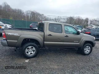 2015 Toyota Tacoma with VIN 3TMLU4EN1FM201554, listed as a IAAI auction lot 42008012 with 118,313 mi miles and . Bid and sale history available at DreamBid. Image 13.