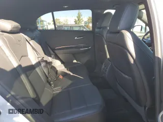2021 Cadillac XT4 FWD Luxury z VIN 1GYAZAR49MF081955, wystawiony jako Copart lot #76611074 z przebiegiem 34 635 mil mil oraz Szkoda całkowita • Salvage title. Historia ofert i sprzedaży dostępna na DreamBid. Obrazek 11.