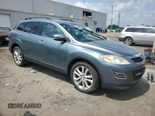 2012 Mazda CX-9 Grand Touring with VIN JM3TB2DVXC0361644, listed as a Copart auction lot 66092895 with 121,021 mi miles and Clean title. Bid and sale history available at DreamBid. Image 4.