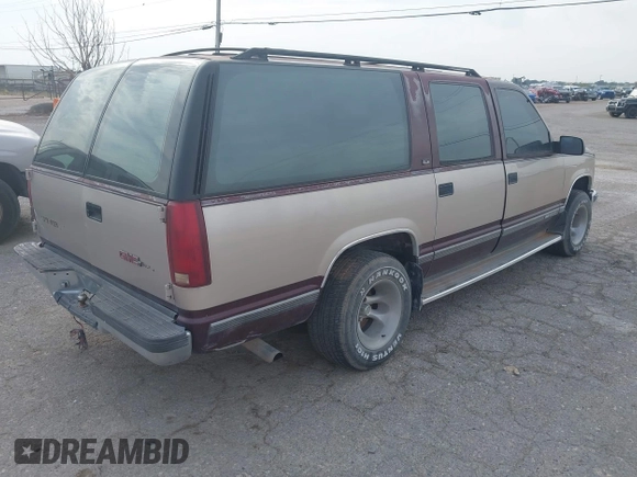 1993 GMC Suburban with VIN 1GKEC16KXPJ734150, listed as a IAAI auction lot 42114021 with 254,501 mi miles and . Bid and sale history available at DreamBid. Image 4.