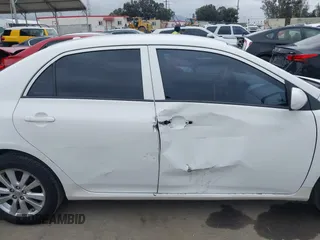 2010 Toyota Corolla with VIN 2T1BU4EE0AC359882, listed as a IAAI auction lot 42051633 with 227,481 mi miles. Bid and sale history available at carsss.com. Image 13.