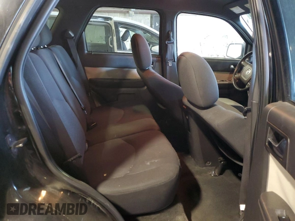 2009 Mercury Mariner with VIN 4M2CU91779KJ12744, listed as a Copart auction lot 73102964 with 164,117 mi miles and Salvage Title. Bid and sale history available at carsss.com. Image 11.