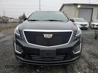 2020 Cadillac XT5 Sport AWD with VIN 1GYKNGRS5LZ232546, listed as a Copart auction lot 84104644 with 25,276 mi miles and Salvage title. Bid and sale history available at DreamBid. Image 5.