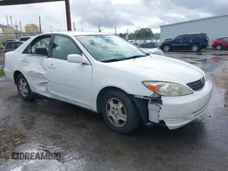 2002 Toyota Camry XLE z VIN 4T1BF30KX2U035422, wystawiony jako IAAI lot #41762363 z przebiegiem 220 465 mil mil oraz . Historia ofert i sprzedaży dostępna na DreamBid. Obrazek 1.