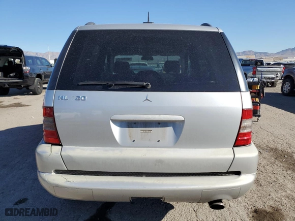 2001 Mercedes-Benz M-Class with VIN 4JGAB54E91A274807, listed as a Copart auction lot 50099165 with 250,220 mi miles and Salvage Title. Bid and sale history available at carsss.com. Image 6.