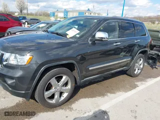2011 Jeep Grand Cherokee Limited with VIN 1J4RR5GG4BC624876, listed as a IAAI auction lot 41877272 with 166,810 mi miles. Bid and sale history available at carsss.com. Image 2.