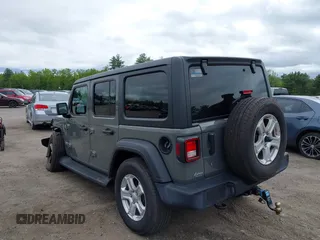 2020 Jeep Wrangler Unlimited Black and Tan with VIN 1C4HJXDG5LW187222, listed as a IAAI auction lot 42238194 with 9,237 mi miles and . Bid and sale history available at DreamBid. Image 3.