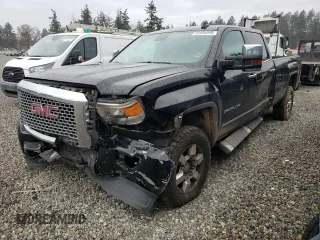 2016 GMC Sierra 3500HD Denali z VIN 1GT42YE82GF140938, wystawiony jako Copart lot #52556095 z przebiegiem 136 654 mil mil oraz Szkoda całkowita • Salvage title. Historia ofert i sprzedaży dostępna na DreamBid. Obrazek 1.