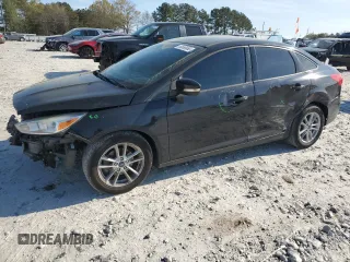2017 Ford Focus SE with VIN 1FADP3F26HL331253, listed as a Copart auction lot 50869865 with 60,776 mi miles and Salvage title. Bid and sale history available at DreamBid. Image 1.