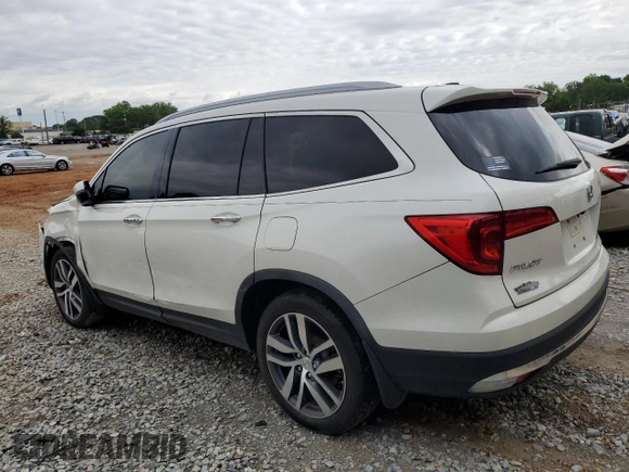 2017 Honda Pilot Touring z VIN 5FNYF6H92HB067140, wystawiony jako Copart lot #55757925 z przebiegiem 132 425 mil mil oraz Szkoda całkowita • Salvage title. Historia ofert i sprzedaży dostępna na DreamBid. Obrazek 2.