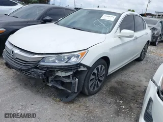 2017 Honda Accord Hybrid with VIN JHMCR6F36HC008930, listed as a IAAI auction lot 41601414 with 159,359 mi miles. Bid and sale history available at carsss.com. Image 2.