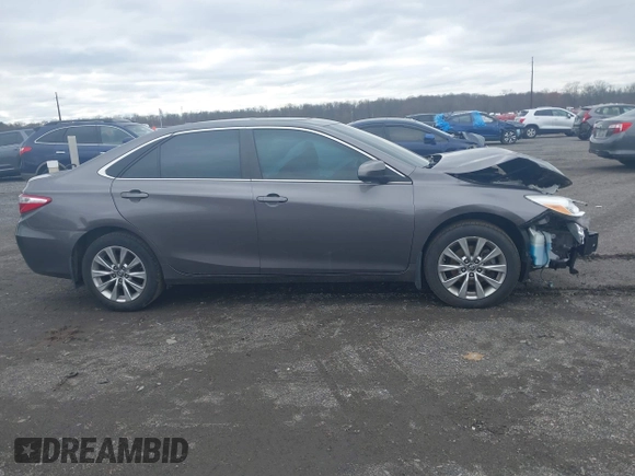 2015 Toyota Camry XLE with VIN 4T1BF1FKXFU936775, listed as a IAAI auction lot 41807486 with 97,148 mi miles and . Bid and sale history available at DreamBid. Image 14.