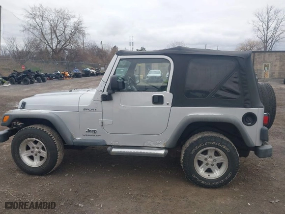 2004 Jeep Wrangler Sport with VIN 1J4FA49S64P749380, listed as a IAAI auction lot 41935405 with 84,690 mi miles. Bid and sale history available at carsss.com. Image 14.