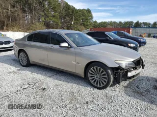 2012 BMW 7 Series 750Li с VIN WBAKB8C54CC965064, выставлен на аукционе Copart как лот 46308795 с пробегом 103 301 миль миль и Списание • Salvage title. История ставок и продаж доступна на DreamBid. Изображение 4.