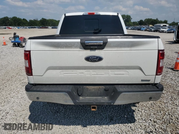 2018 Ford F-150 XL with VIN 1FTEW1EP0JFA28850, listed as a Copart auction lot 63585615 with 210,626 mi miles and Salvage title. Bid and sale history available at DreamBid. Image 6.