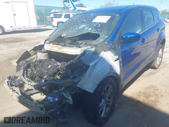 2017 Ford Escape SE with VIN 1FMCU9GD2HUA10771, listed as a IAAI auction lot 39225590 with 56,324 mi miles and . Bid and sale history available at DreamBid. Image 6.