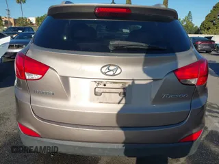 2013 Hyundai Tucson GLS with VIN KM8JU3AC0DU705782, listed as a IAAI auction lot 41804846 with 81,260 mi miles. Bid and sale history available at carsss.com. Image 16.