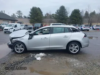 2015 Volvo V60 T5 Drive-E Premier with VIN YV140MEK9F1218549, listed as a IAAI auction lot 41728257 with 131,844 mi miles. Bid and sale history available at carsss.com. Image 14.