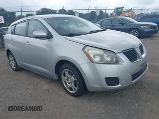 2009 Pontiac Vibe 1SB with VIN 5Y2SL67019Z403809, listed as a IAAI auction lot 42823402 with 168,130 mi miles and . Bid and sale history available at DreamBid. Image 1.