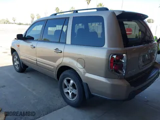 2006 Honda Pilot EX-L with RES with VIN 5FNYF28606B049523, listed as a IAAI auction lot 41736427 with 274,199 mi miles. Bid and sale history available at carsss.com. Image 3.
