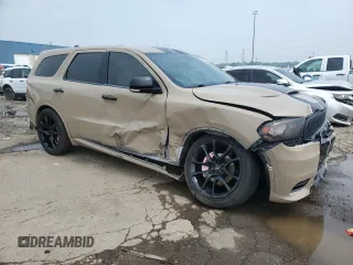 2018 Dodge Durango R/T with VIN 1C4SDJCTXJC219511, listed as a Copart auction lot 60043295 with 135,782 mi miles and Salvage title. Bid and sale history available at DreamBid. Image 4.